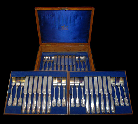 Swedish and English sterling silver knife and fork set, 18 of each (est. $1,800-$2,000). Elite Decorative Arts image.